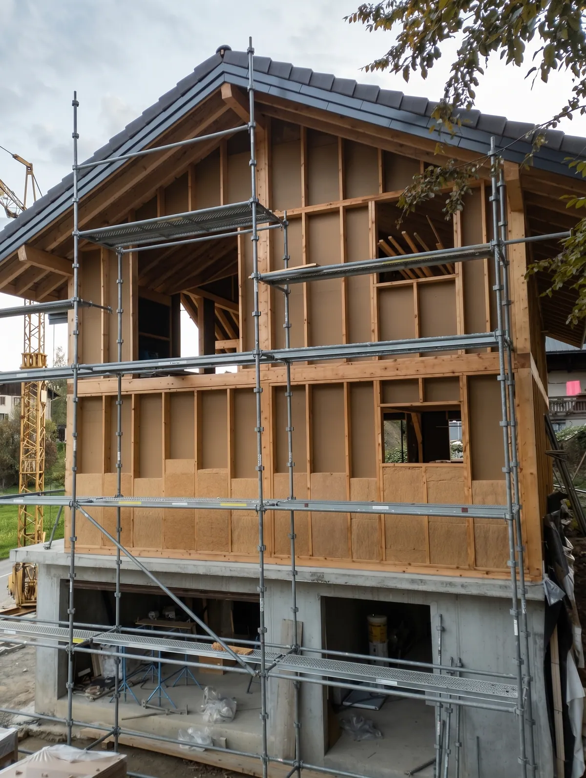 Maison à ossature bois sous échafaudage